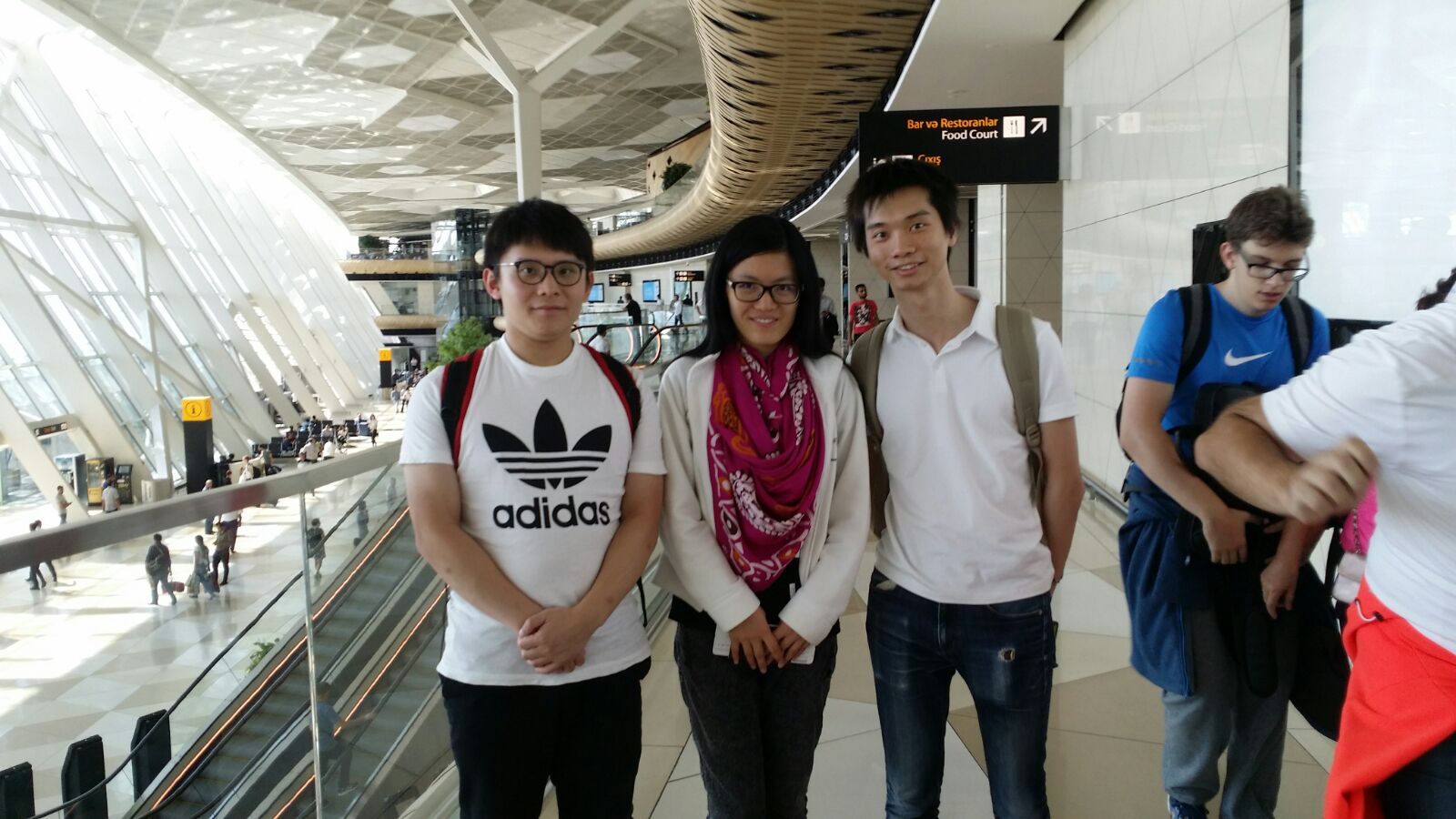 CM Pang Yui Kuen, World Woman Champion Hou Yi Fan, FM Brian Wong (left to right)